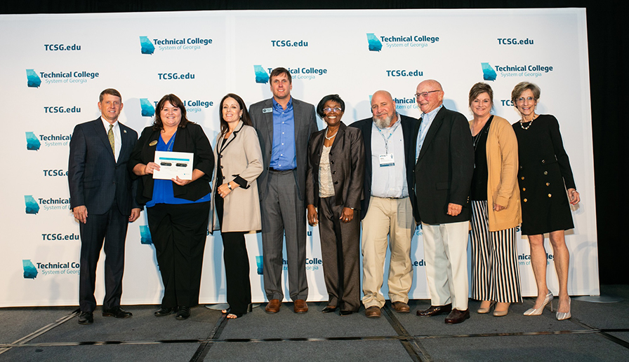 Technical College System of Georgia Commissioner Greg Dozier, Wiregrass President DeAnnia Clements, Wiregrass Executive Director of Fundraising Crissy Staley, Wiregrass Foundation South Trustee Chairman Michael Smith, Wiregrass Board of Director Alfalene Walker, Wiregrass and TCSG 2020 Rick Perkins Instructor of the Year Mike Day, Wiregrass Foundation North Trustee Tom Smith, Executive Director for Academic Success Mona Paulk, TCDA Director Adie Shimandle.