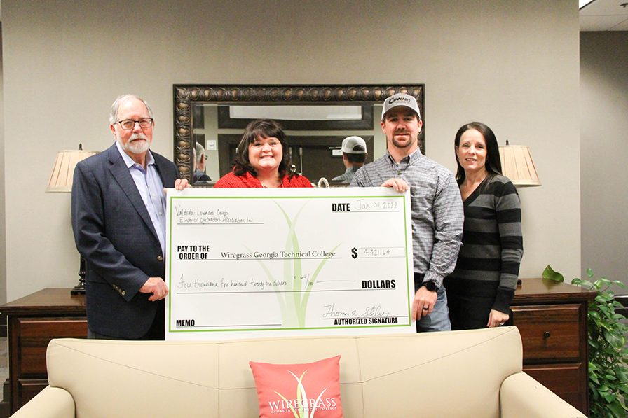 Members of the Valdosta – Lowndes Electrical Contractors Association, Inc. presented the Wiregrass Foundation with a check to go toward the Electrical Technology programs.  Pictured l-r; Ace Electric CEO, Emeritus Thomas Stalvey, Wiregrass President DeAnnia Clements, Cowart Electric Vice President Thomas Ley, and Wiregrass Executive Director of Fundraising Crissy Staley.