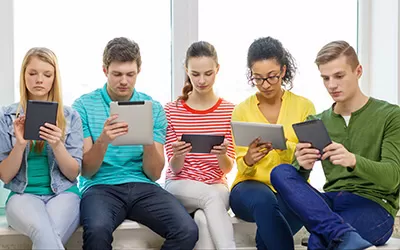 Group of high school students with tablets