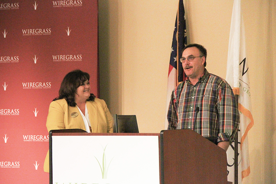 Precision Machining Program Coordinator, Darron Lanier, has been named Wiregrass Georgia Technical College’s 2022 Rick Perkins Instructor of the Year, he is pictured with Wiregrass President DeAnnia Clements.