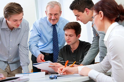 Tutor with group of students