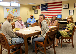 SVA members seated around a table